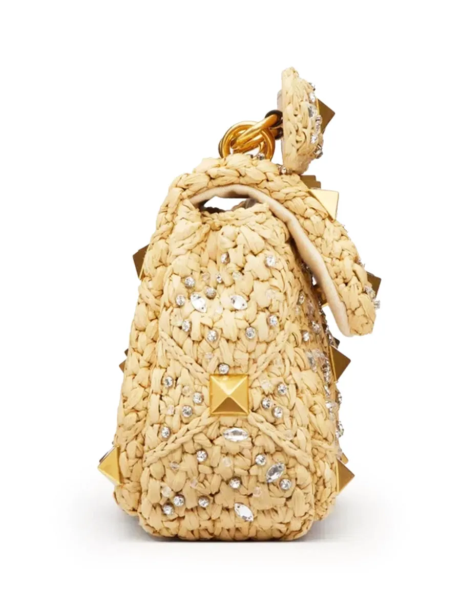 Medium Roman Stud The Shoulder Bag in Raffia with Chain and Rhinestones