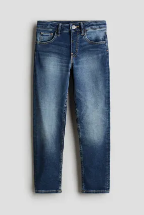 Relaxed Tapered Fit Jeans - Regular waist - Long - Dark denim blue - Kids | H&M GB